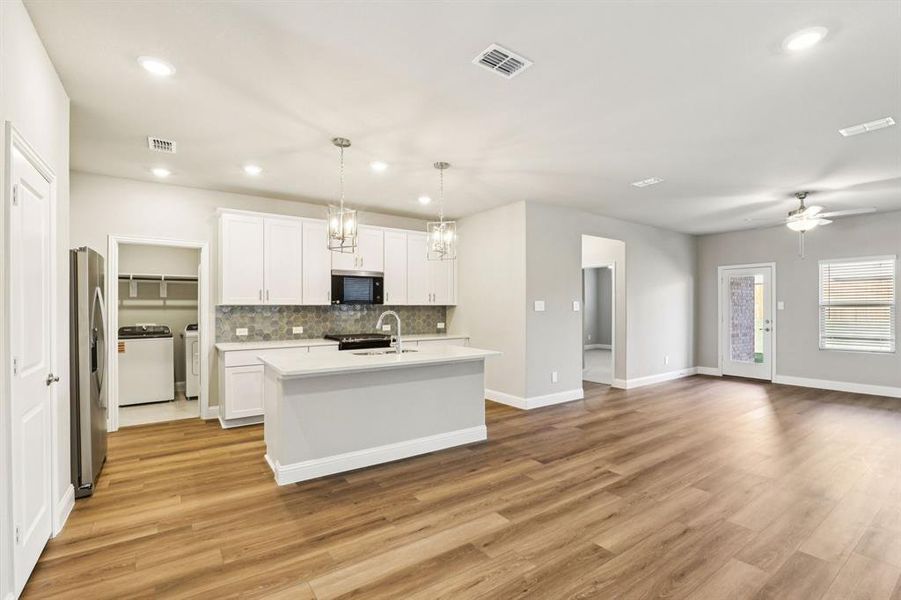 Furnished interior view inside a new home in Simpson Crossing - Spring Series, McKinney (Image 7). Furnished interior view inside a new home in Simpson Crossing - Spring Series, McKinney (Image 7).