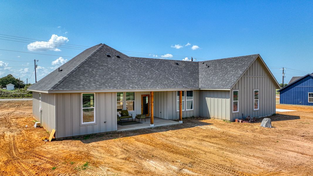 Representative exterior photo of a completed home built from the Loretta by Zeal Home Builders in Parallel Pastures, Poolville, TX (Image 26).