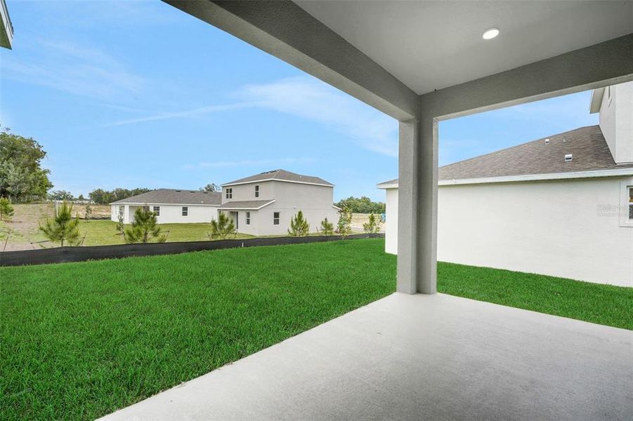 Exterior details and patio area of a home in Tuscan Hills, Dade City (Image 23).