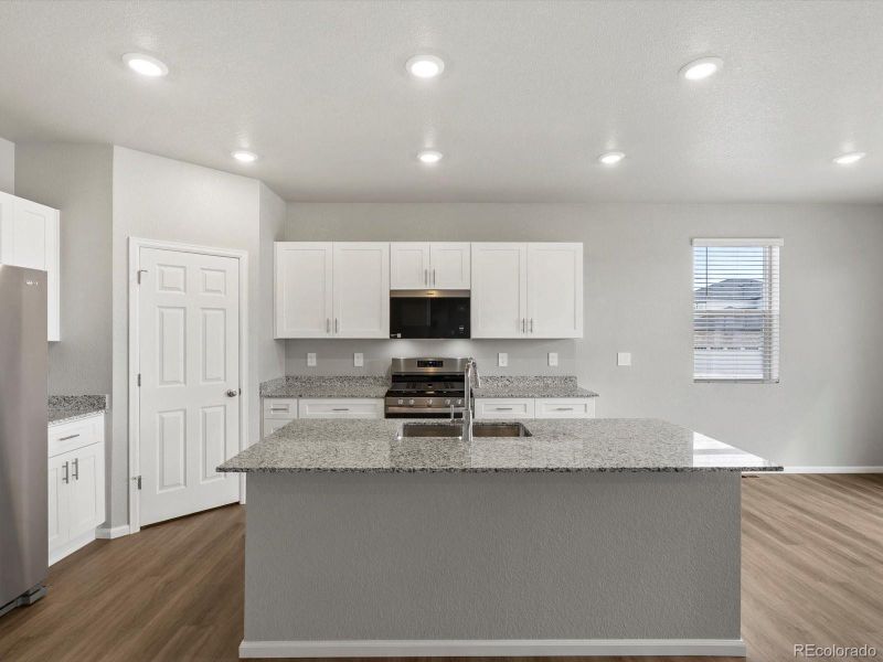 Furnished interior view inside a new home in Ridgeline Vista: The Flora Collection, Brighton (Image 7). Furnished interior view inside a new home in Ridgeline Vista: The Flora Collection, Brighton (Image 7).