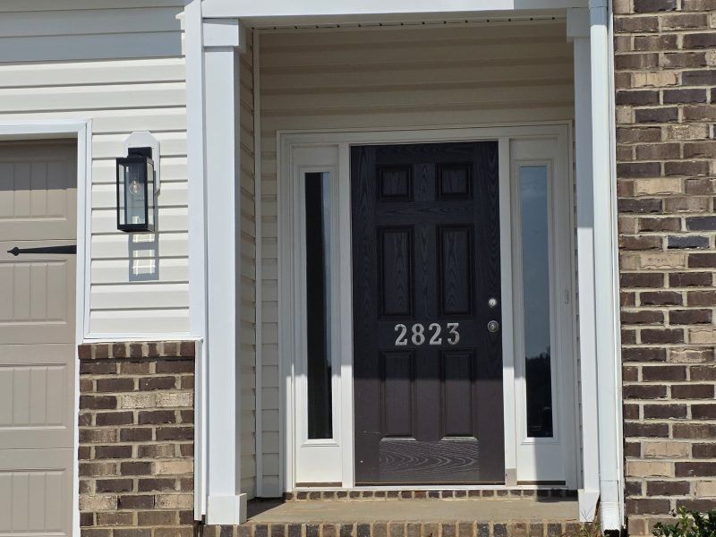 Exterior details and patio area of a home in Miller's Reserve, Winston-Salem (Image 17). Exterior details and patio area of a home in Miller's Reserve, Winston-Salem (Image 17).