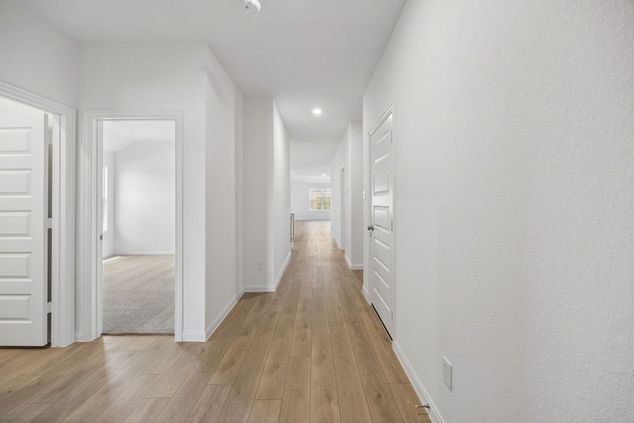 Spacious, unfurnished interior of a new home in Meridiana, Manvel (Image 13).