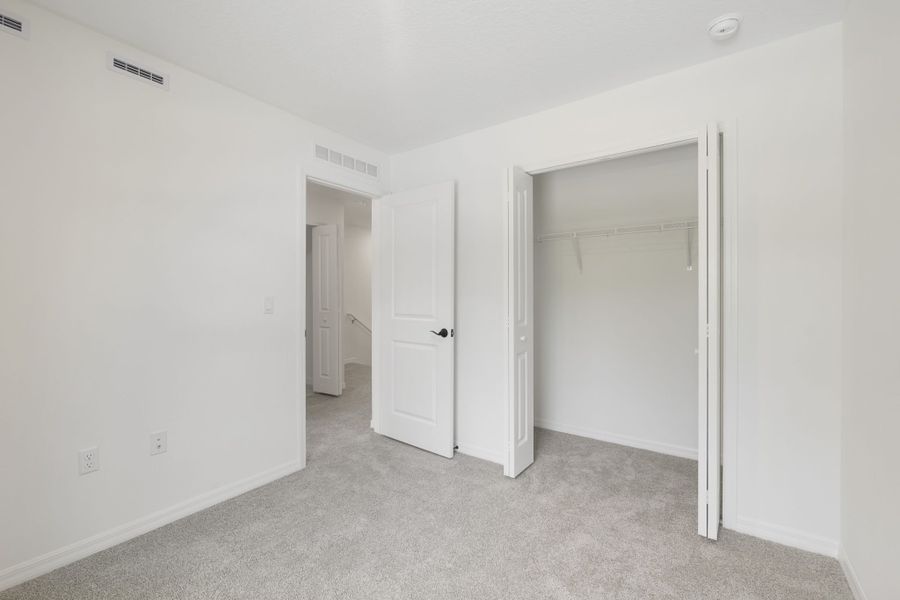 Spacious, unfurnished interior of a new home in Towns at Riverwalk, Sanford (Image 24).