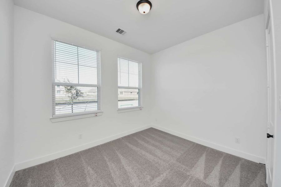 Representative unfurnished interior of a home built from the Summerton by Chesmar Homes in Meridiana 50's and 60's, Manvel (Image 50).