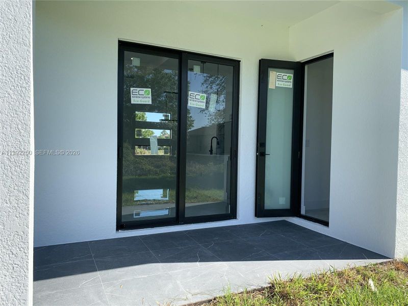 Exterior details and patio area of a home in , Lehigh Acres (Image 4).