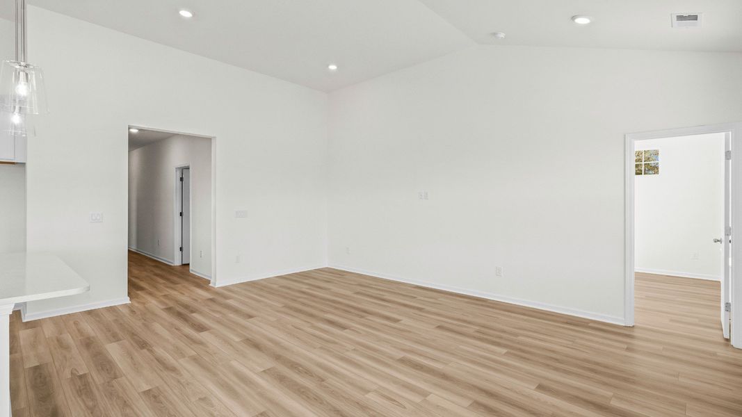 Expanded view of the Easton living room highlighting its airy layout and modern design Expanded view of the Easton living room highlighting its airy layout and modern design