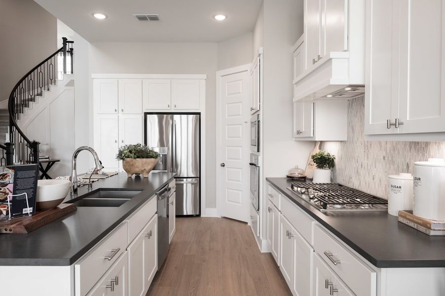 Representative furnished interior of a home built from the Verdin by Tri Pointe Homes in Pecan Ridge, Fulshear (Image 90).