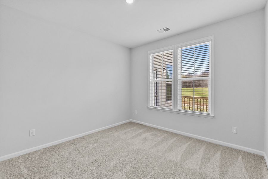 Spacious, unfurnished interior of a new home in Lilah Grove, Summerfield (Image 33).
