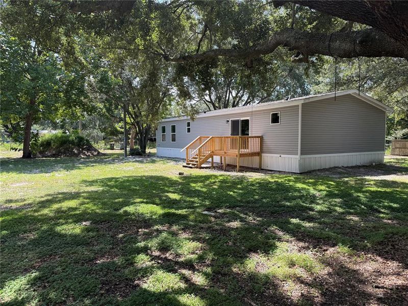 Exterior details and patio area of a home in , Polk City (Image 16).