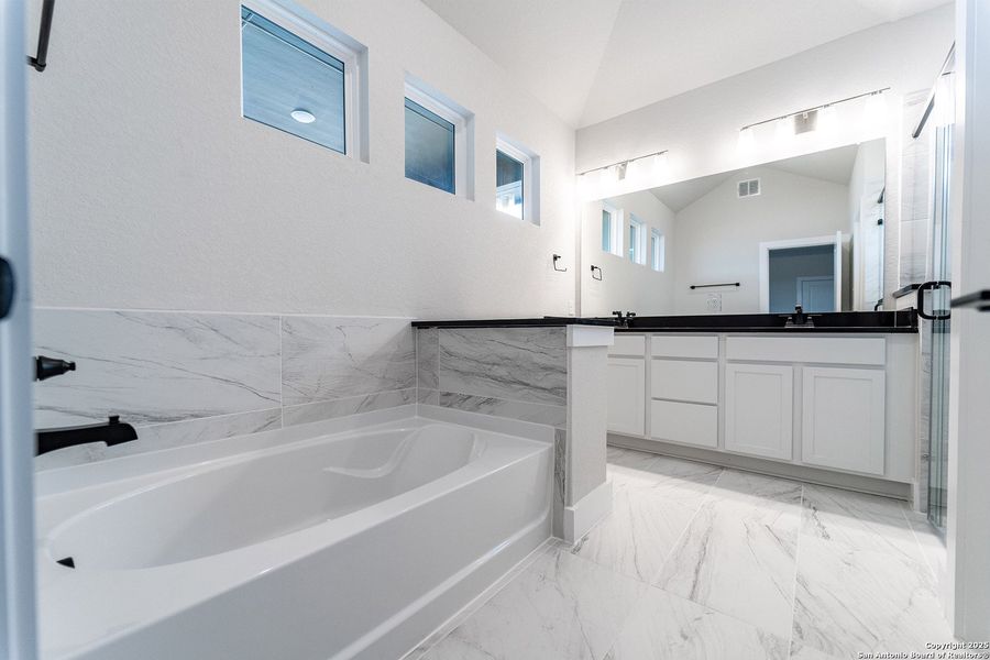 Furnished interior view inside a new home in The Woodlands at Medina Hills, Mico (Image 11).