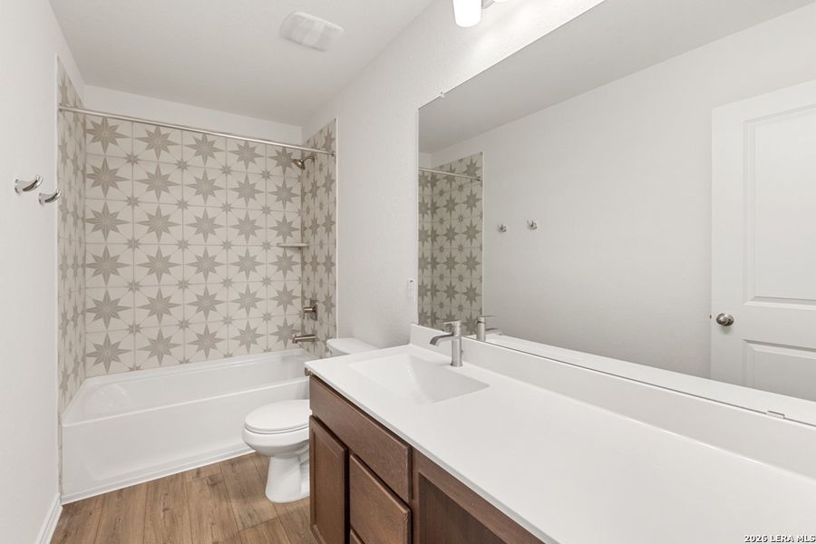 Furnished interior view inside a new home in Woodside Farms, Seguin (Image 7).