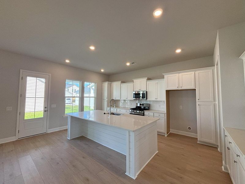 Furnished interior view inside a new home in Sweetgrass at Summers Corner, Summerville (Image 9).