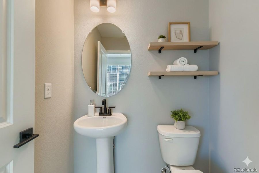 Staged powder bath. Photos are not of actual home.