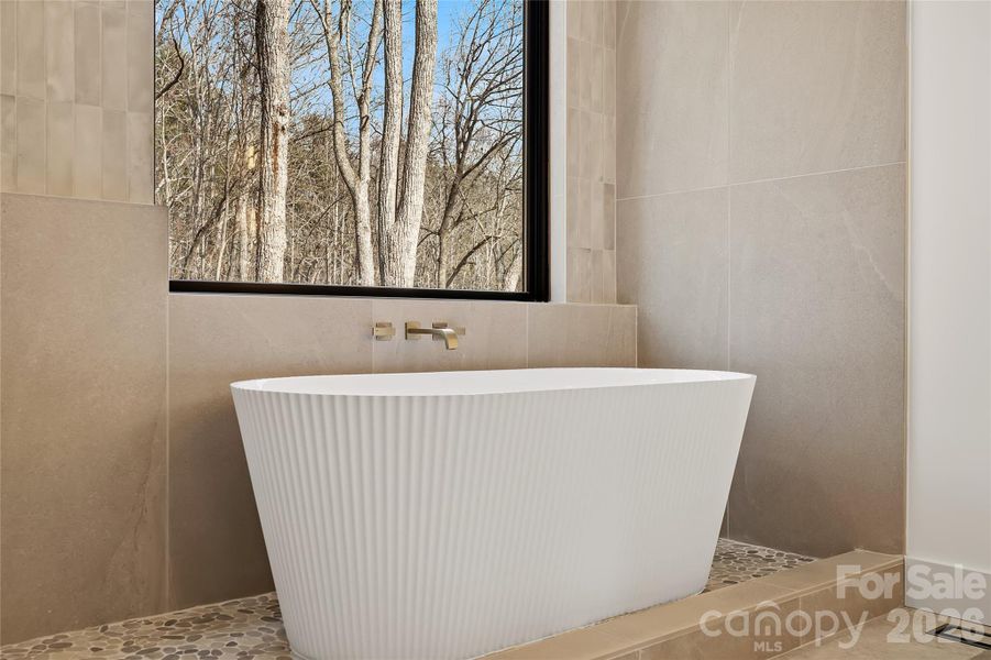 Statement fluted soaking tub