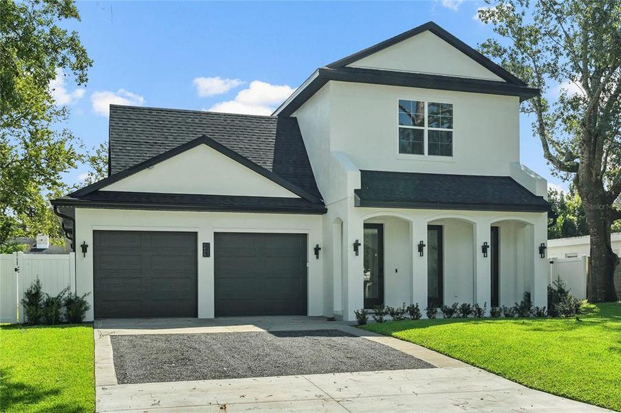 Front exterior of a new home in , Winter Park, FL, highlighting curb appeal (Image 32).