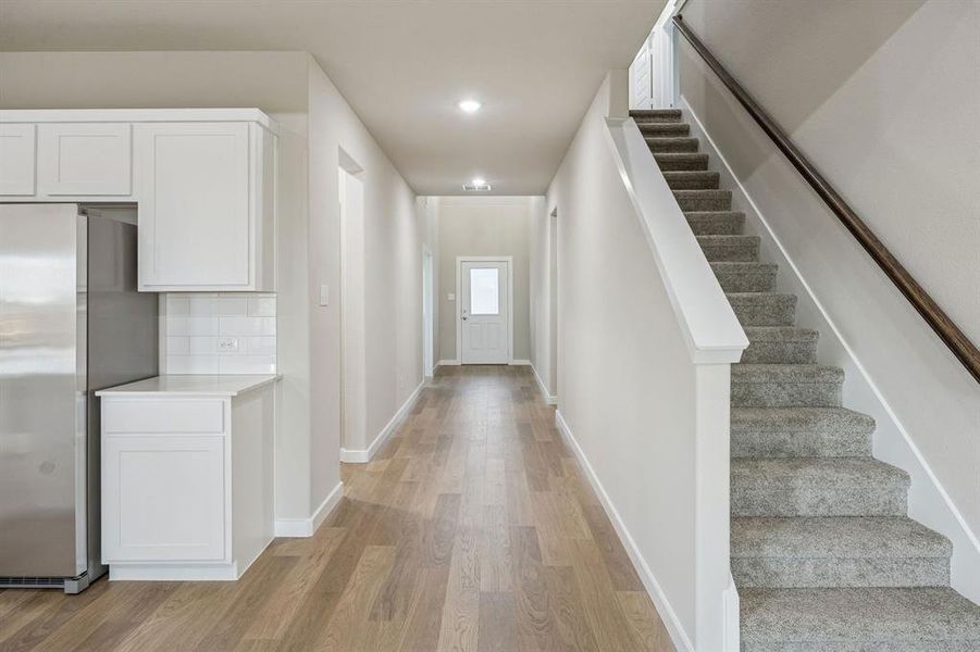 Open First Floor in the Wimbledon home plan by Trophy Signature Homes – REPRESENTATIVE PHOTO