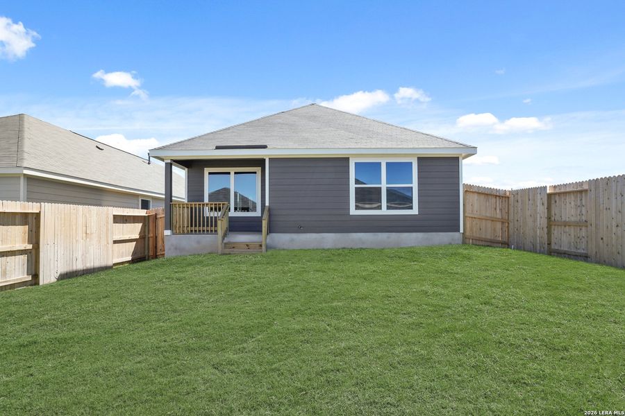 Exterior details and patio area of a home in Hickory Ridge, Elmendorf (Image 16).