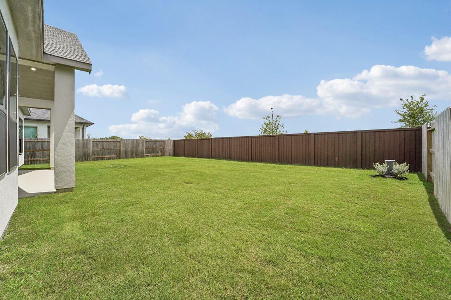 Exterior details and patio area of a home in Del Bello Lakes 60', Manvel (Image 26).