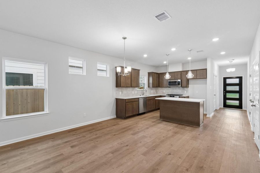 The Kettering II- Family Room into Dining Area and Kitchen