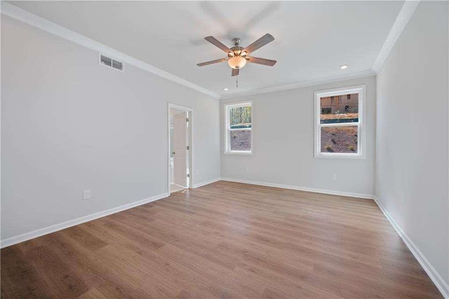 Spacious, unfurnished interior of a new home in The Paddocks at Doc Hughes, Buford (Image 40).