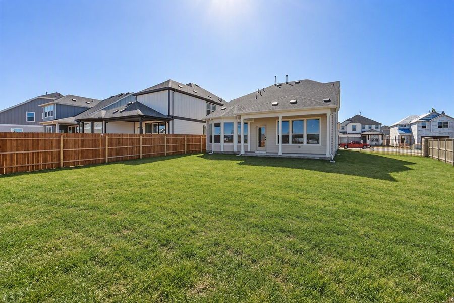 Exterior details and patio area of a home in Santa Rita Ranch, Liberty Hill (Image 26).