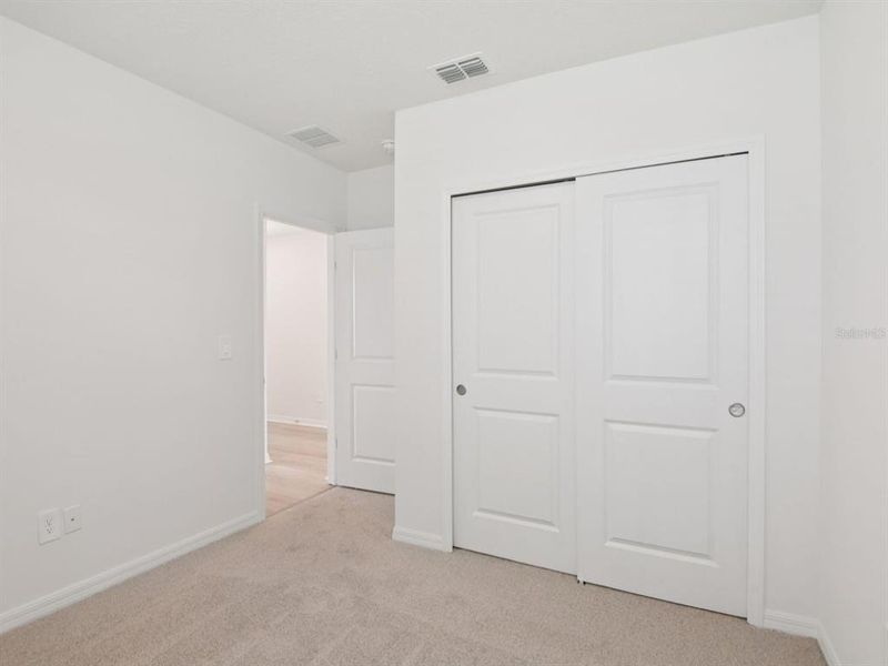 Spacious, unfurnished interior of a new home in Magnolia Bay - Classic Series, Nokomis (Image 16).