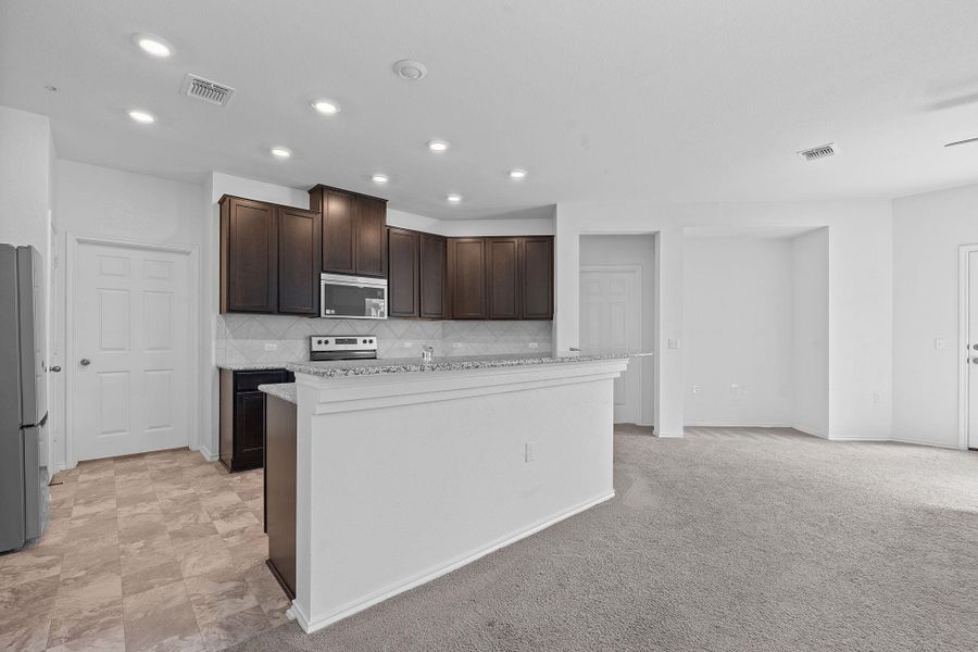 Furnished interior view inside a new home in EastVillage - Heritage Collection, Manor (Image 9). Furnished interior view inside a new home in EastVillage - Heritage Collection, Manor (Image 9).