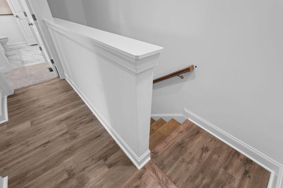 Representative unfurnished interior of a home built from the The Magnolia by The Providence Group in Market Square at Sawnee Village, Cumming (Image 19).