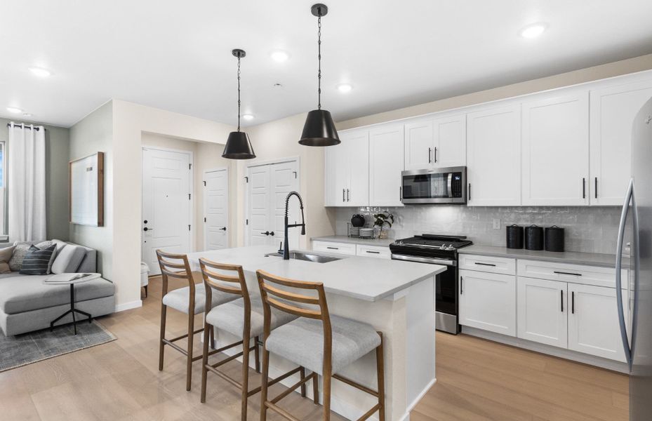 Representative furnished interior of a home built from the Rowen by Pulte Homes in Barefoot Village, Longmont (Image 14).