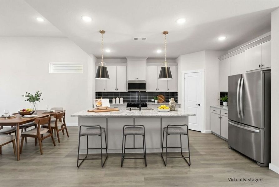 Furnished interior view inside a new home in Willow Grove Single-Family Homes, Melissa (Image 9).