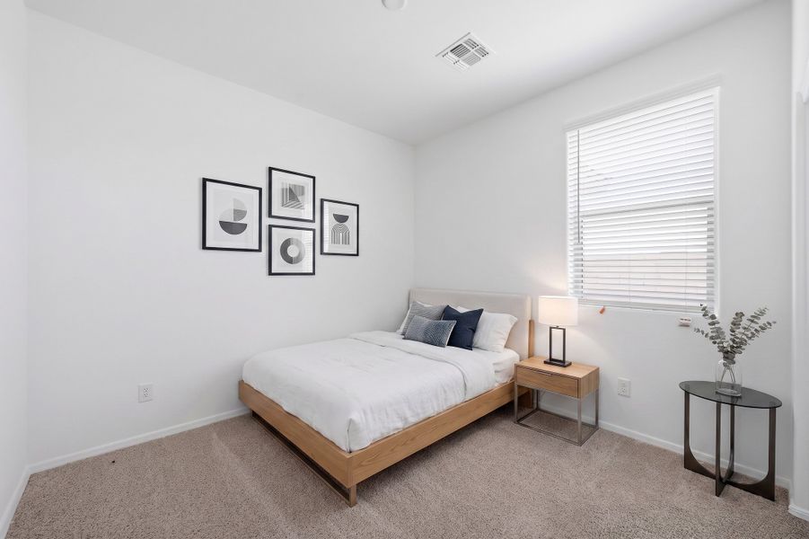 Furnished interior view inside a new home in Marbella at Windrose, Waddell (Image 9).