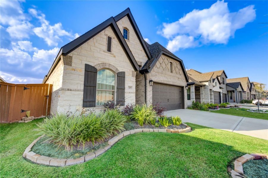 Front exterior of a new home in , Katy, TX, highlighting curb appeal (Image 27).