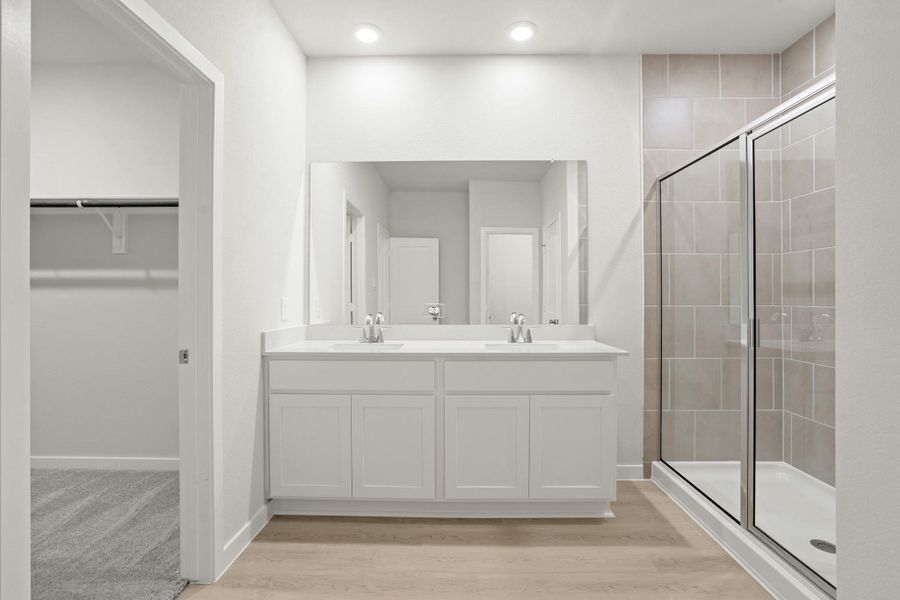 Furnished interior view inside a new home in Sunterra, Katy (Image 5).