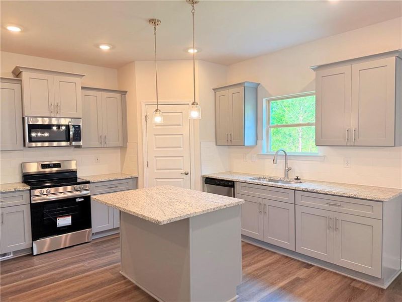 Furnished interior view inside a new home in Magnolia Villas, Cornelia (Image 5).