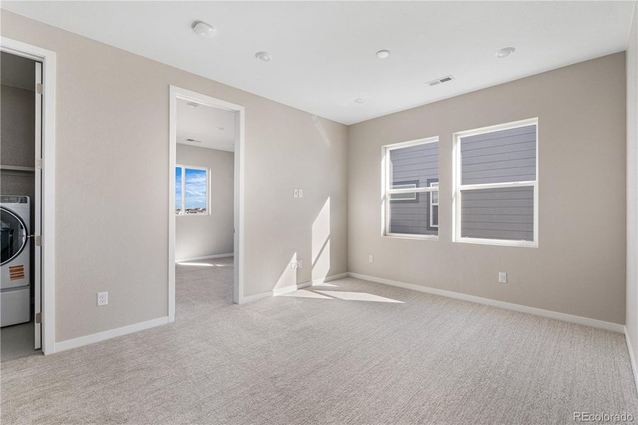 Spacious, unfurnished interior of a new home in Portrait at The Canyons, Castle Pines (Image 29).
