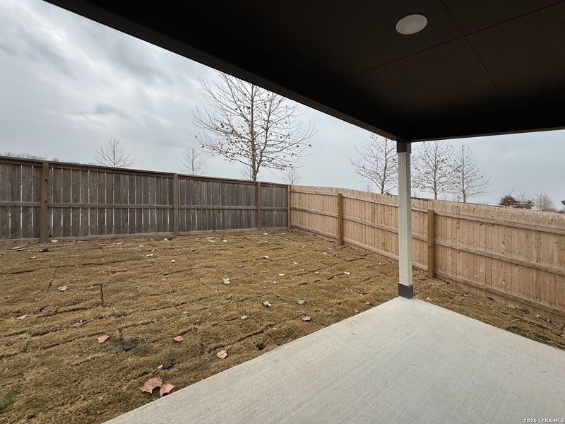 Exterior details and patio area of a home in Hennersby Hollow, San Antonio (Image 4).