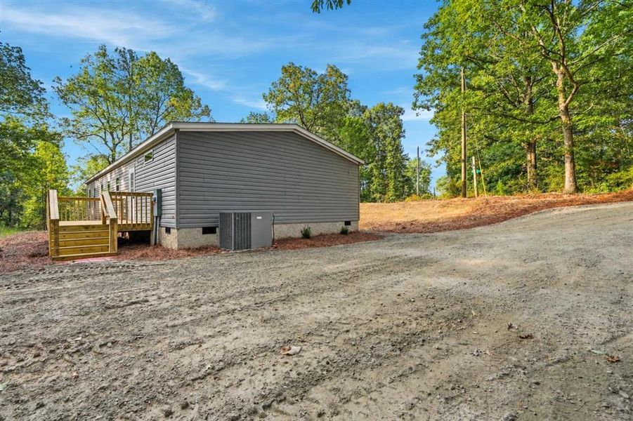 Exterior details and patio area of a home in , Dawsonville (Image 17).