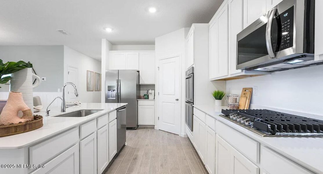 Furnished interior view inside a new home in Saddle Oaks: Saddle Oaks 50s, Jacksonville (Image 5).