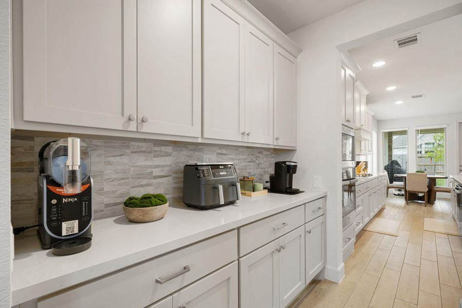 Furnished interior view inside a new home in , Manvel (Image 17).