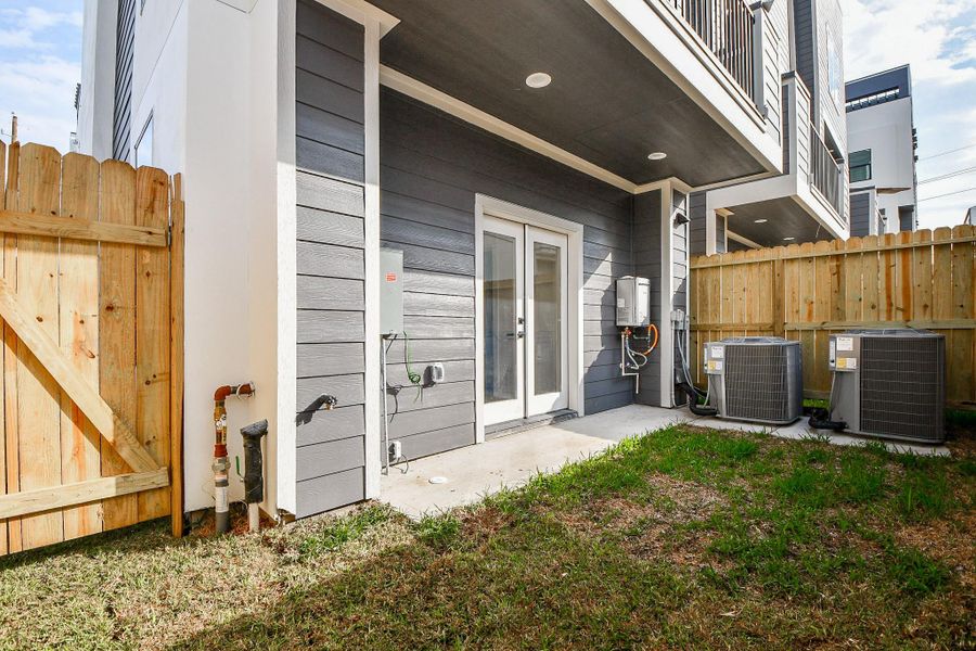 Exterior details and patio area of a home in , Houston (Image 2).
