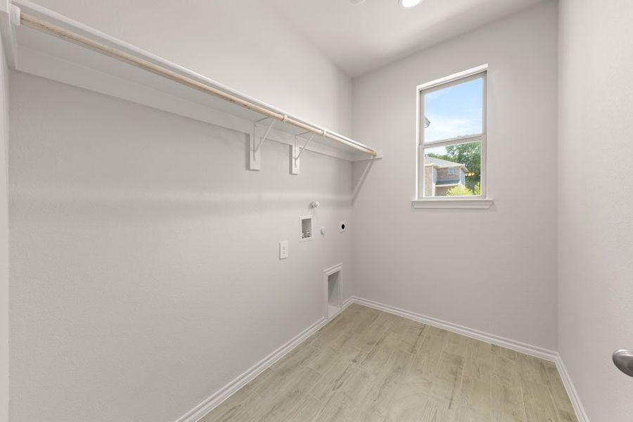 Representative exterior photo of a completed home built from the Mesquite by Impression Homes in Bryant Farms, Melissa, TX (Image 24). Representative exterior photo of a completed home built from the Mesquite by Impression Homes in Bryant Farms, Melissa, TX (Image 24).