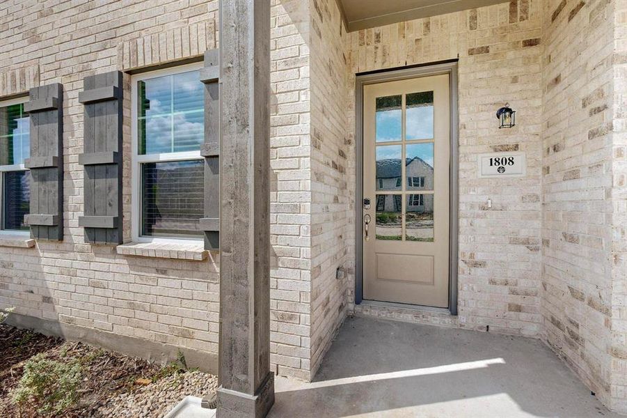Exterior details and patio area of a home in Solterra Texas, Mesquite (Image 3).