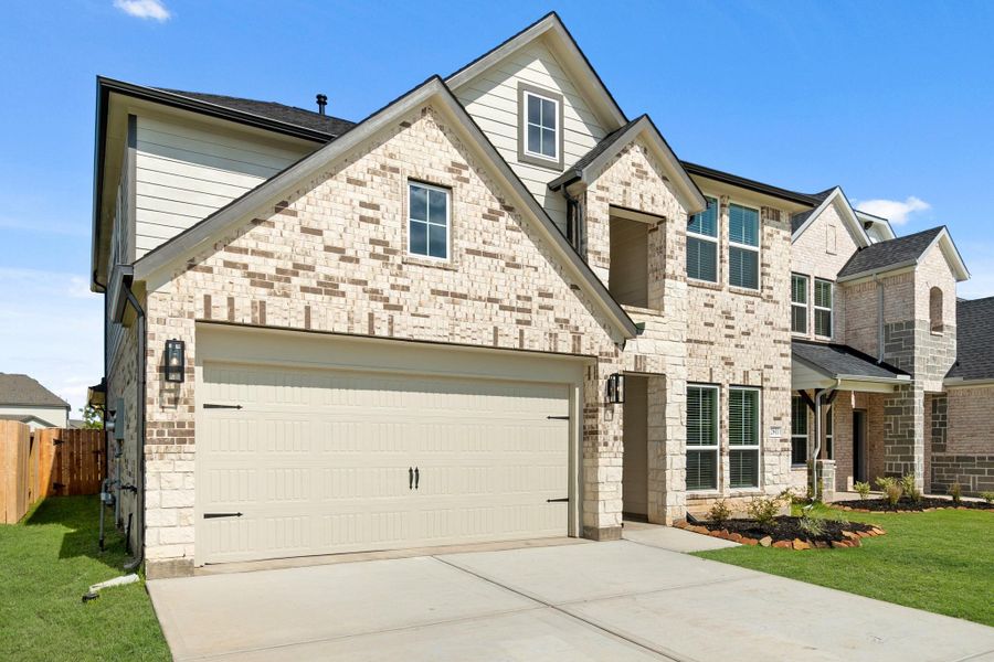 Front exterior of a new home in Morton Creek Ranch, Katy, TX, highlighting curb appeal (Image 17). Front exterior of a new home in Morton Creek Ranch, Katy, TX, highlighting curb appeal (Image 17).