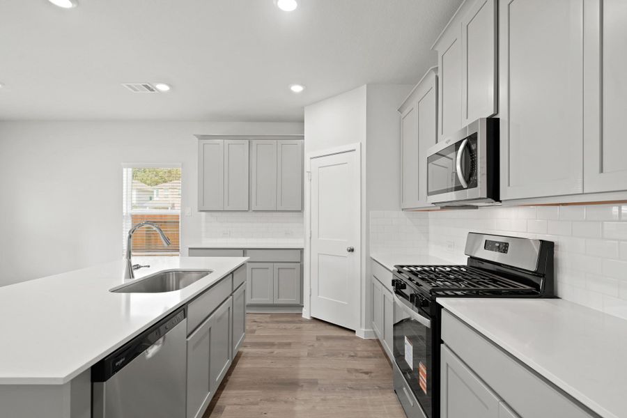 Furnished interior view inside a new home in Lakes at Black Oak, Magnolia (Image 6).