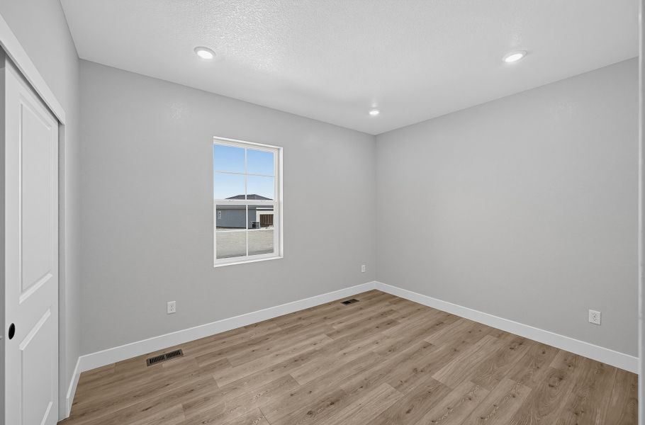 Spacious, unfurnished interior of a new home in Trailstone, Arvada (Image 22).