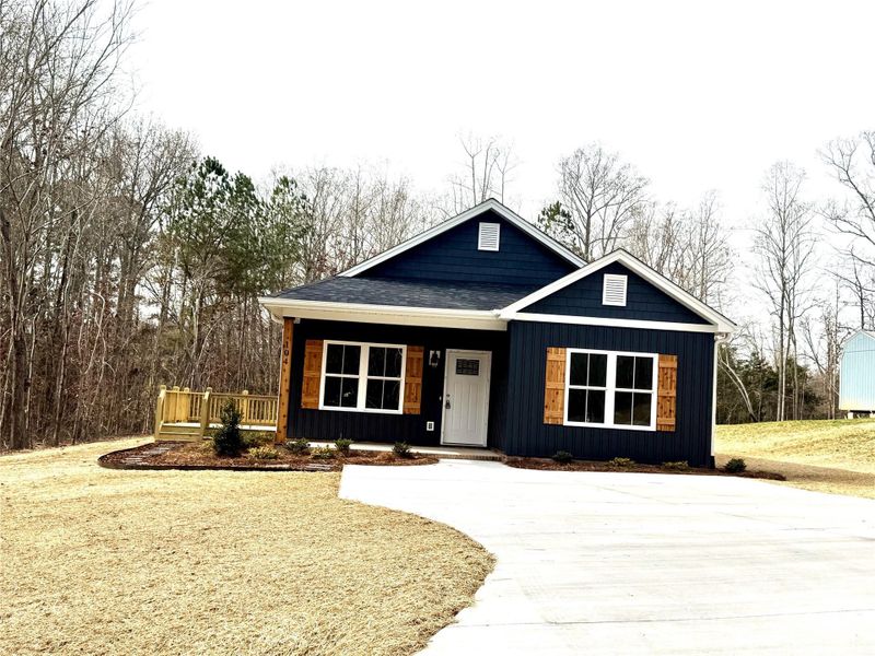 Front exterior of a new home in , Grover, NC, highlighting curb appeal (Image 2). Front exterior of a new home in , Grover, NC, highlighting curb appeal (Image 2).