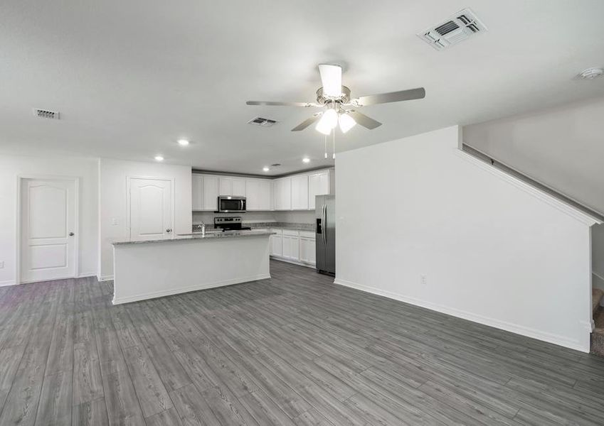 The family room is spacious with plenty of natural light