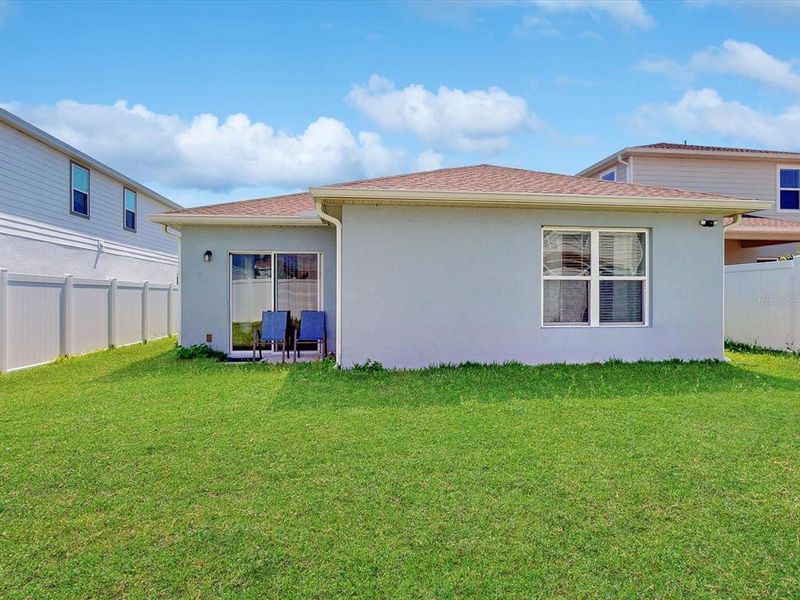Front exterior of a new home in , Davenport, FL, highlighting curb appeal (Image 20).