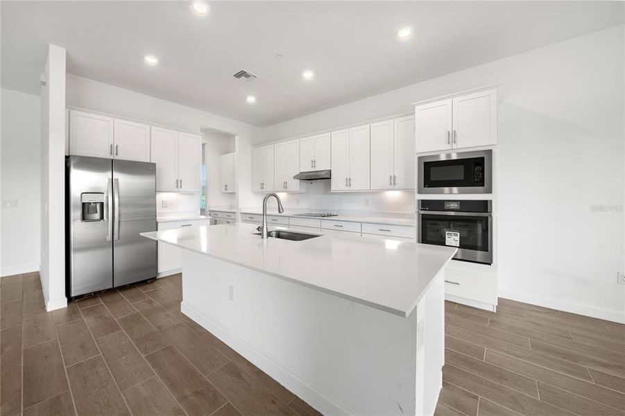 Furnished interior view inside a new home in Calusa Country Club, Lakewood Ranch (Image 3).