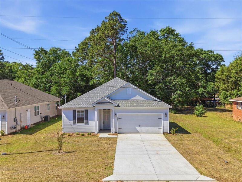 Front exterior of a new home in , Orangeburg, SC, highlighting curb appeal (Image 30).